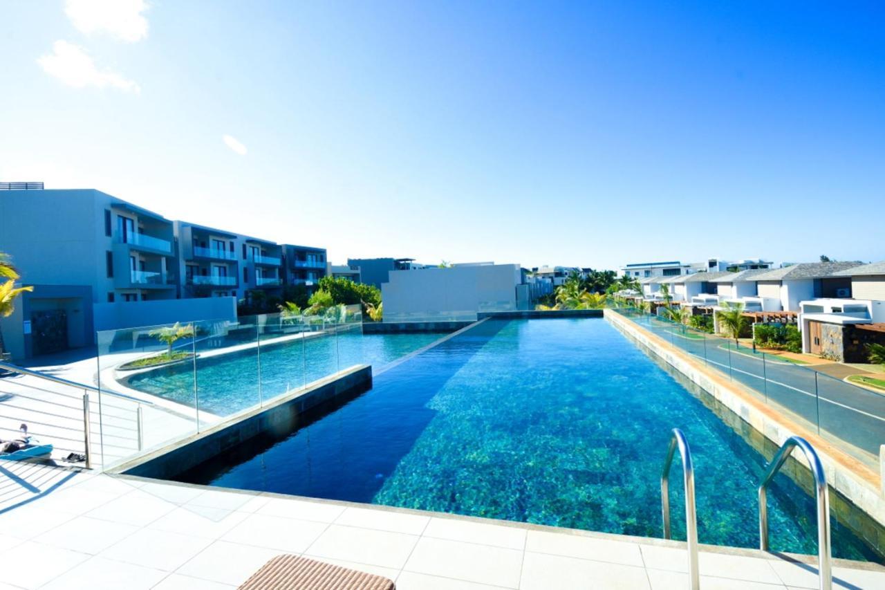 Apartment With 3 Bedrooms In Roches Noires, With Wonderful Sea View, Shared Pool, Terrace Rivière du Rempart Eksteriør bilde